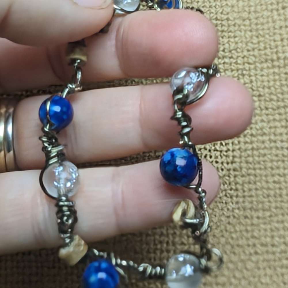 Vintage-Inspired Blue and Silver Bracelet with Ornate Design